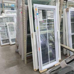 White Vinyl Casement Window with Grilles