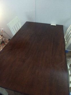 Wooden Ashley furniture kitchen table.