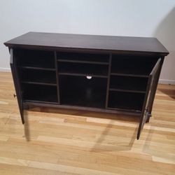TV STAND DARK BROWN  WITH BOTTOM  SHELFS  WITH GLASS DOORS HEAVY  WOOD
