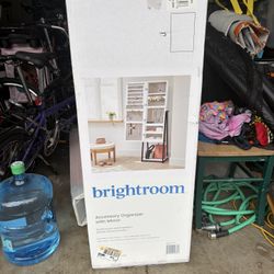 Brand New Jewelry Armoire With Mirror. Never Used.