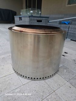 Solo Stove 19.5" Fire Pit and wood.
