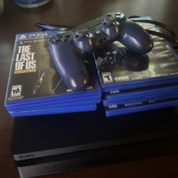PS4 With Controller And Games 