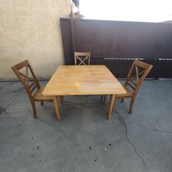 WOODEN TABLE AND 3 CHAIRS