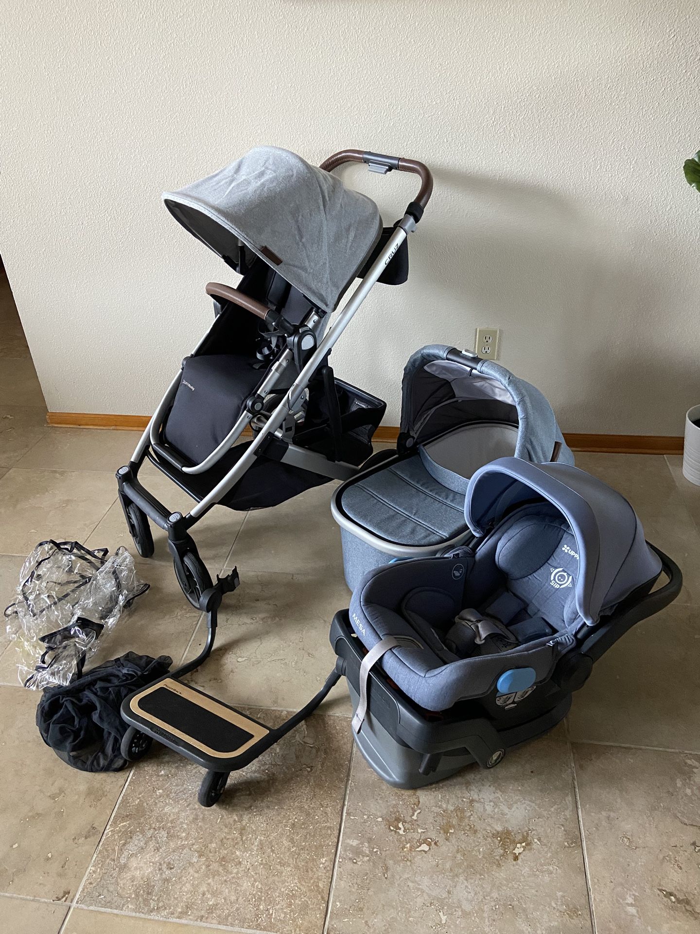 Uppababy Cruz V2 Stroller With Car Seat And Bassinet And Piggyback Board