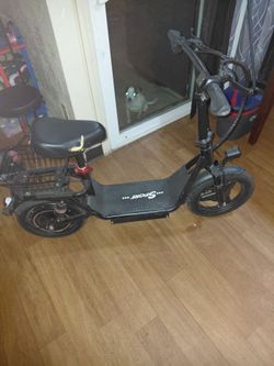 Adult size scooter with seat