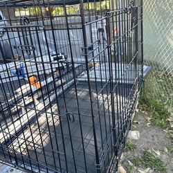 A 36" DOG CRATE USE ONCE