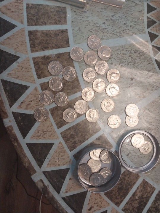 Coins Half Dollar, Some Missing a Letter Making Them Worth A Lot More
