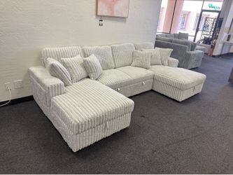 Sectional sleeper with storage