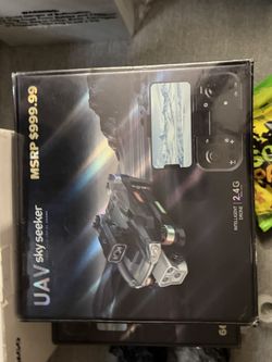 NIB DRONE ($999.99 )DMES UAV Sky Seeker (Aka P19 or L4+ model), a four-axis aerial intelligent drone. While the box displays a suggested retail price 