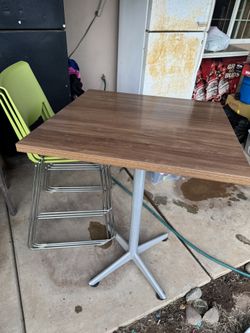 High Top Table With 3 Green Chairs