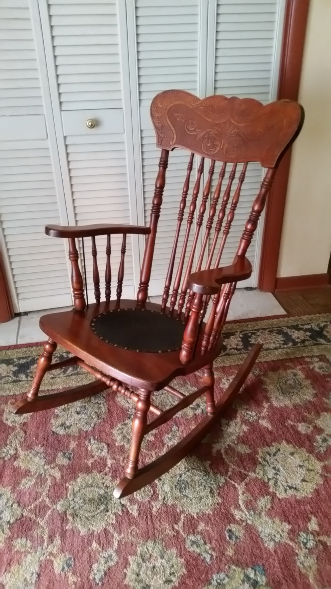 Antique rocking chair 2024 with leather seat