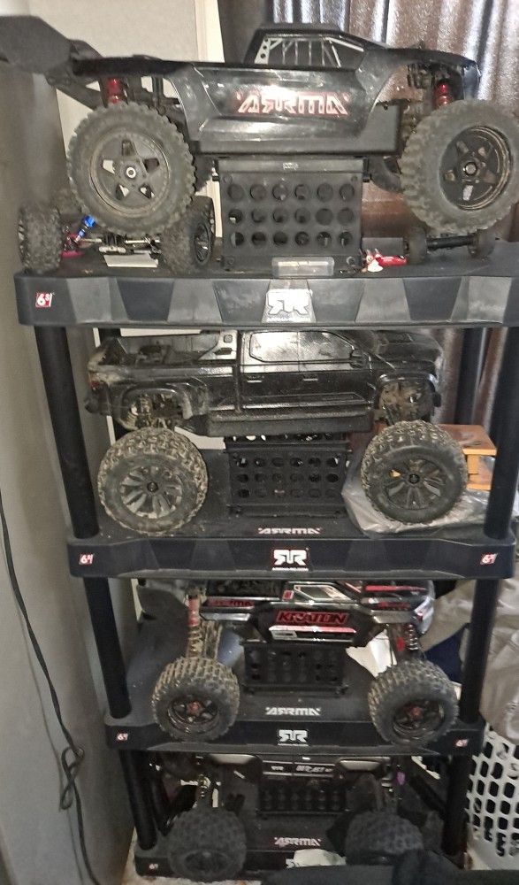 4 Arrma RC 6s Trucks For $800 Plus Accessories ,batteries ,charger and Shelf 800 Obo