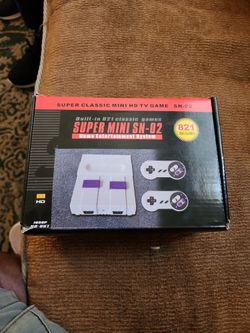 SUPER MINI SN-02. 821 GAMES. HDMI OUT. EXCELLENT CONDITON $50 OR BEST OFFER