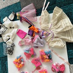 Lot of VTG/Modern Barbie Shoes,accessories , Doll clothes and shoes. All shoes are paired. 