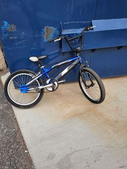 Blue and silver  custom bmx bike
