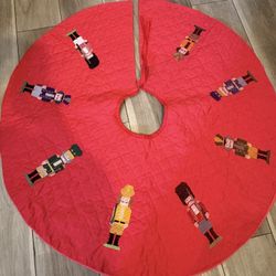 Vintage Christmas tree skirt decorated with embroidered nutcracker figures