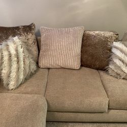 Elegant Beige Sectional Couch with Decorative Pillows  