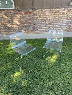 Two vintage acrylic chairs