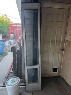 Dog door for sliding glass door