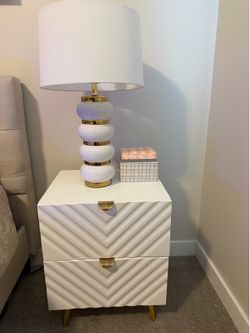 Gorgeous white and gold bedroom set. 2 nightstands and dresser