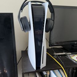 Ps5 With Two Headsets And The New Assassins Creed Game