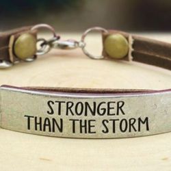 NWOT STRONGER THAN THE STORM LEATHER BRACELET 