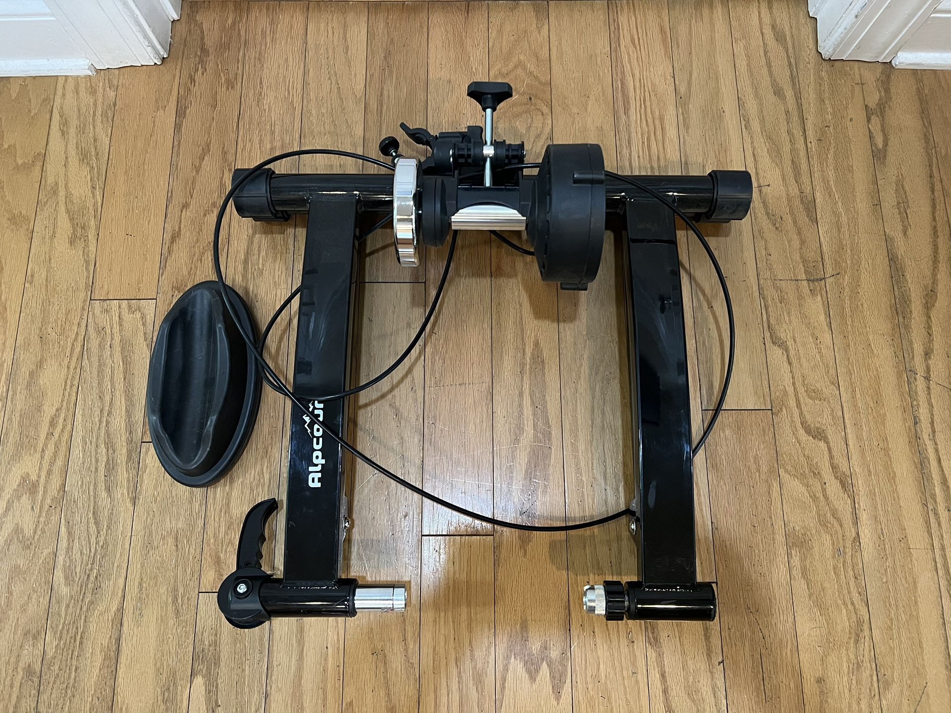 ALPCOUR Bike Trainer Stand for Indoor Riding – Portable Magnetic (Good condition) PICK UP IN CORNELIUS