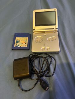 Game Boy Advance SP with Pokémon Blue and Charger