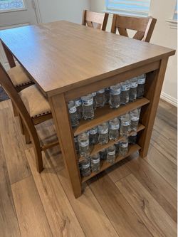 Solid wood dining set. 36” x 60” bar height.