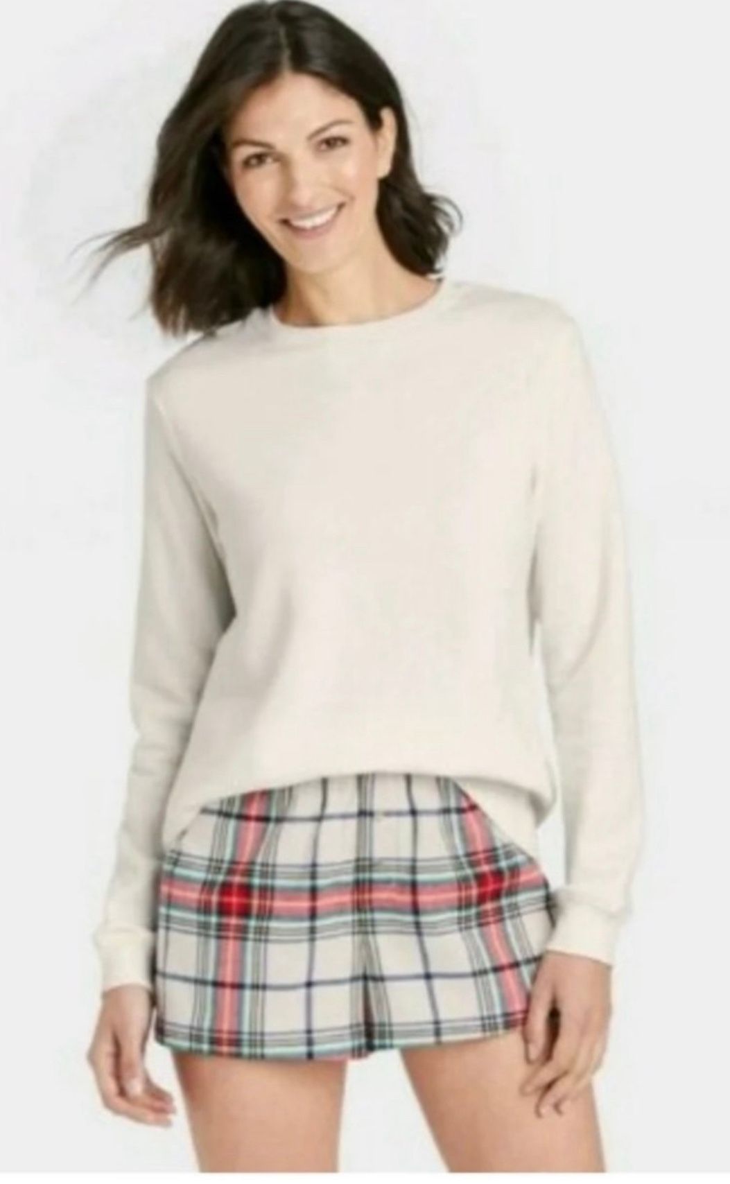 Pajama set includes plush sweatshirt, flannel shorts small.  (O)