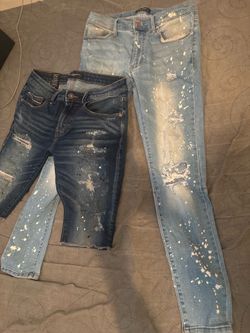 Two pairs of men’s ripped jeans