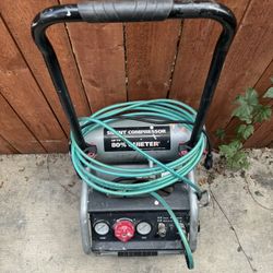  Used Husky - 4.5 Gal. 175 PSI Portable Electric Oil-Free Air Compressor with husky hose. 