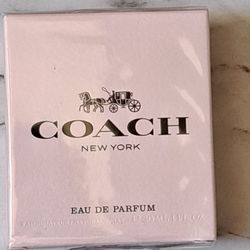 NEW & SEALED COACH WOMAN'S PARFUM SPRAY 30$