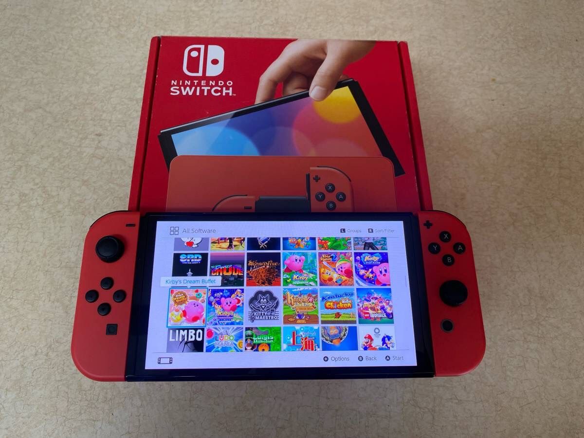 Nintendo Swith OLED with 100 Switch Games And Over 7500 Reteo Arcade Games