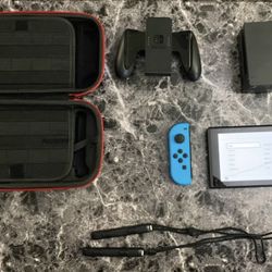 Nintendo Switch Console, Remotes, Docking Station And Carrying Case