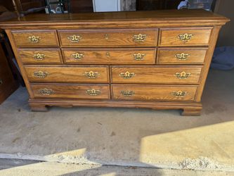 10  DRAWERS. SOLID  WOOD DRESSER  BY BROYHILL