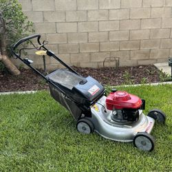 Lawn Mower (Just Serviced)  $300