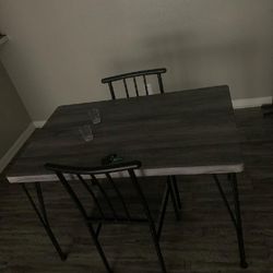 Table and chairs, brand new still in box