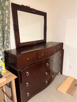 Large dark wood dresser and mirror