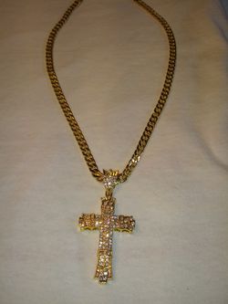 Gold necklace and cross