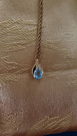 Blue Topaz and Diamond Pendant