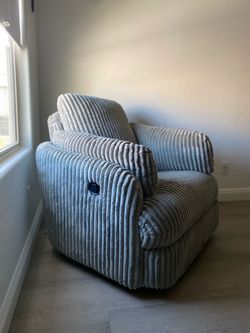 Grey swivel rocking recliner