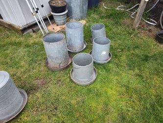 Feeding and watering containers