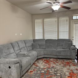Renegade Gray 125" Power Reclining 6 Piece Sectional with USB Port rug and rug mat included.