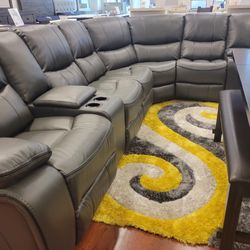 Black Friday sale going on now. Madrid gray leather reclining sectional $1299. Easy finance option. Same day delivery.