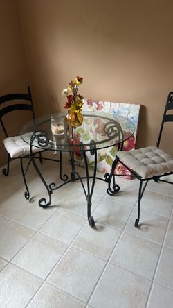 Glass top table and chairs