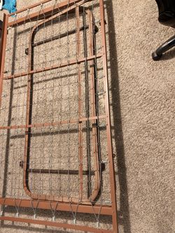 Twin size bed with metal mattress stand