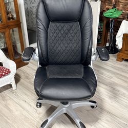 Comfy desk chair, a little worn, but plenty of life still left