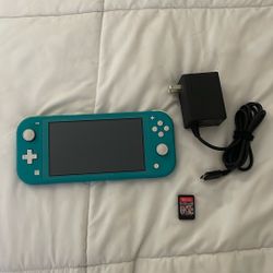 Nintendo Switch Light (Blue) includes Mariokart Deluxe 8 and charger