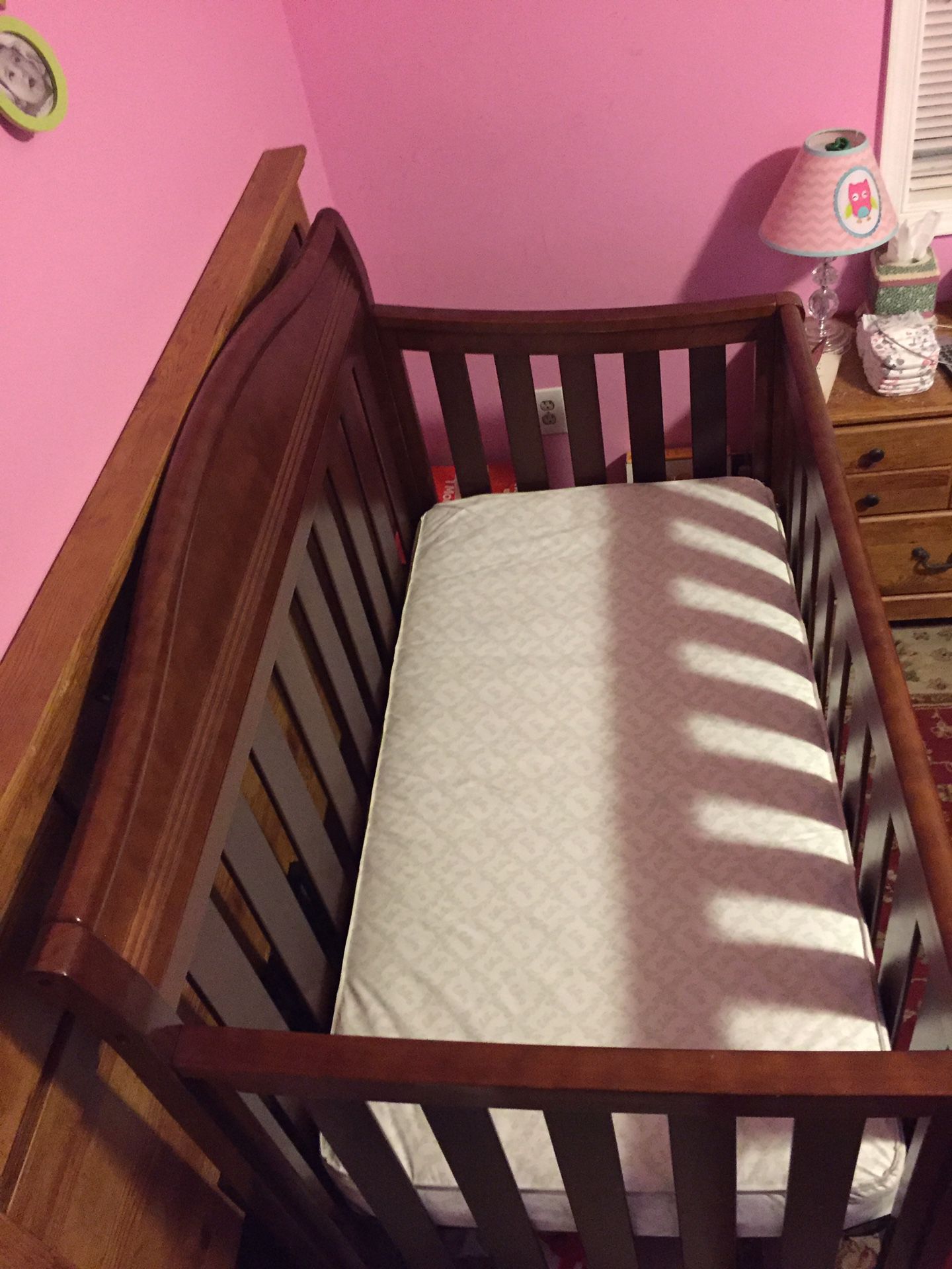 Crib with a Sealy posturemattress